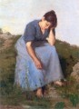 Mujer joven en un campo campo realista Jules Breton